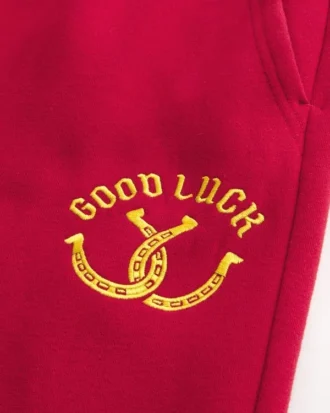 Pantalones de chándal bootcut con gráfico Good Luck