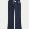 Pantalones de chándal bootcut con gráfico numérico