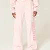 Pantalones de chándal con logo y pierna ancha
