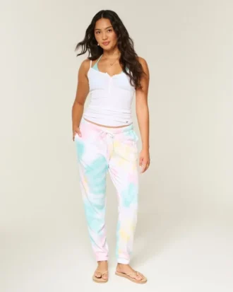Pantalones de chándal de felpa con efecto lavado y logotipo gráfico