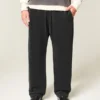 Pantalones de chándal holgados con bordado de araña