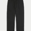 Pantalones de chándal holgados con bordado de araña