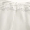 Pantalones de chándal holgados con bordado en la espalda