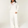 Pantalones de chándal holgados con estampado de bastones de caramelo