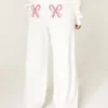 Pantalones de chándal holgados con estampado de bastones de caramelo