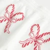 Pantalones de chándal holgados con estampado de bastones de caramelo