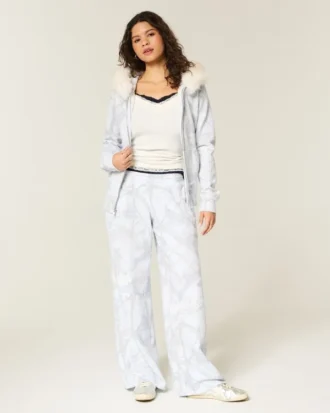 Pantalones de chándal holgados con estampado de camuflaje azul