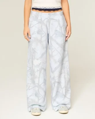 Pantalones de chándal holgados con estampado de camuflaje azul