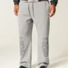Pantalones de chándal holgados con estampado de doble serpiente