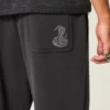 Pantalones de chándal holgados con estampado de serpiente