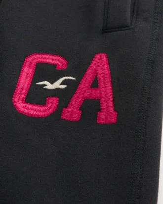 Pantalones de chándal holgados con estampado del logotipo de Vault Release