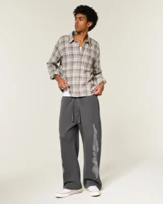 Pantalones de chándal superholgados con gráfico de doble llama