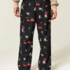 Pantalones de pijama de franela con estampado de Tom y Jerry