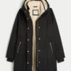 Parka con forro de piel sintética