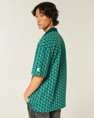 Polo con gráfico de los Spartans de la Universidad Estatal de Michigan
