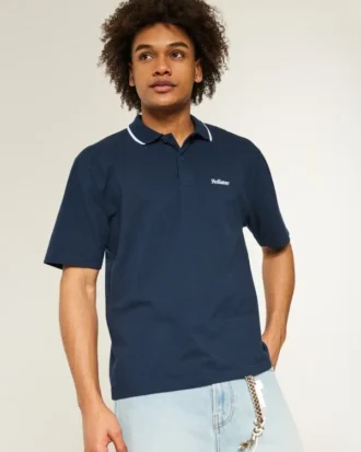 Polo con logotipo relajado