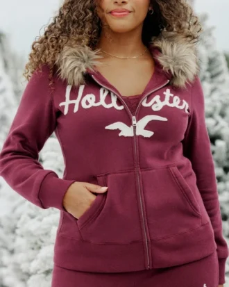 Sudadera con capucha, cremallera, ribete de pelo sintético y logotipo gráfico