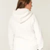 Sudadera con capucha, cremallera y logo gráfico, con forro de sherpa, de la colección Holiday Vault