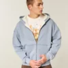 Sudadera con capucha, forro térmico y cremallera