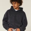 Sudadera con capucha holgada con tachuelas y estampado de Nueva York