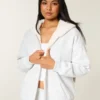 Sudadera con capucha reversible con forro de piel sintética y cremallera