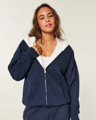 Sudadera con capucha reversible con forro de piel sintética y cremallera