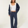 Sudadera con capucha reversible con forro de piel sintética y cremallera