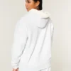 Sudadera con capucha reversible con forro de piel sintética y cremallera