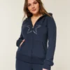 Sudadera con capucha y cremallera con estampado de estrellas