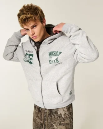 Sudadera con capucha y cremallera, corte cuadrado, con gráfico de los Spartans de la Universidad Estatal de Míchigan