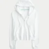 Sudadera con capucha y cremallera de felpa