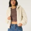 Sudadera con capucha y cremallera de pelo sintético