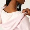 Sudadera con capucha y cremallera forrada de piel sintética