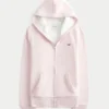 Sudadera con capucha y cremallera forrada de piel sintética