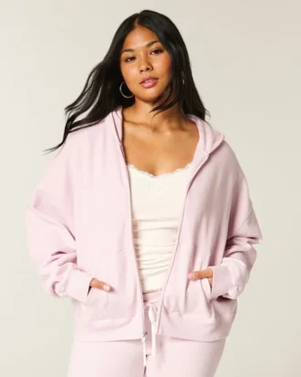 Sudadera con capucha y cremallera oversize