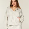 Sudadera con capucha y cremallera oversize con estampado de cierva