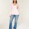 Sudadera con capucha y cuello en V