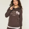Sudadera con capucha y estampado gráfico con forro de piel sintética