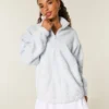 Sudadera con cremallera de un cuarto y bordado de lazo de Gilly Hicks
