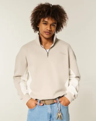 Sudadera con cremallera hasta el pecho y logotipo