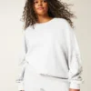 Sudadera con estampado gráfico y tachuelas