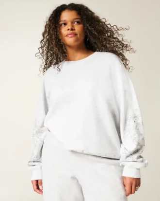 Sudadera con estampado gráfico y tachuelas