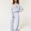 Sudadera con gráfico NYC y hombros descubiertos