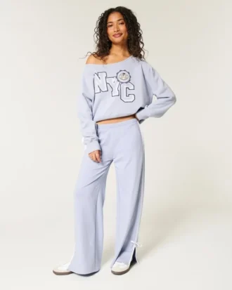 Sudadera con gráfico NYC y hombros descubiertos