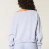 Sudadera con gráfico NYC y hombros descubiertos