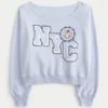 Sudadera con gráfico NYC y hombros descubiertos