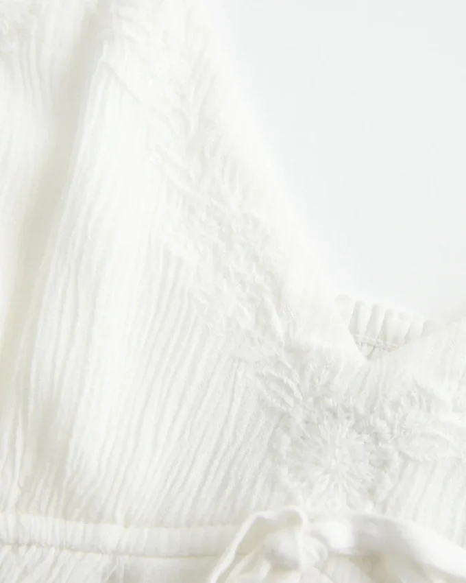Top babydoll arrugado brillante