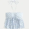 Top babydoll con cuello halter y volantes