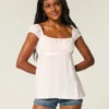 Top babydoll con lazo de satén