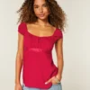 Top babydoll con lazo de satén